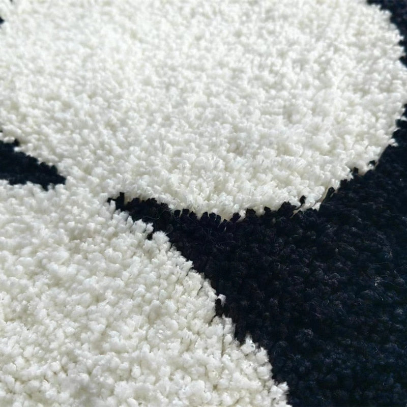 SkandiShop black and white plush rug